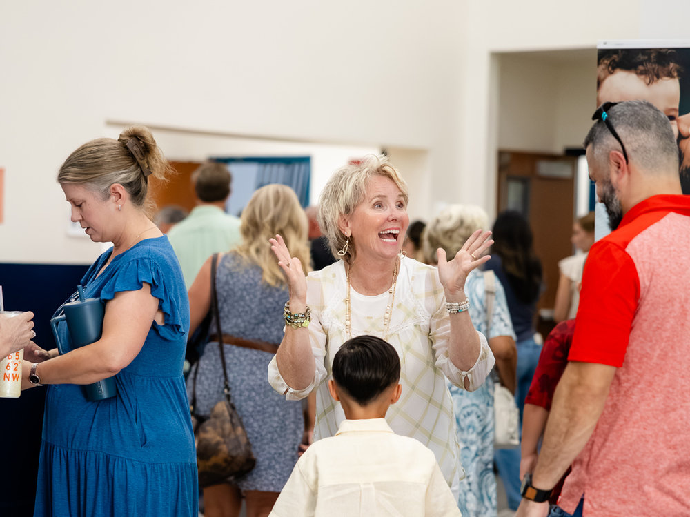 Guests being welcomed on a Sunday morning at Mission City